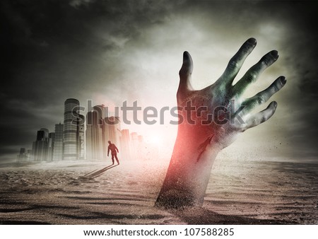 Zombie Rising. A hand rising from the ground!