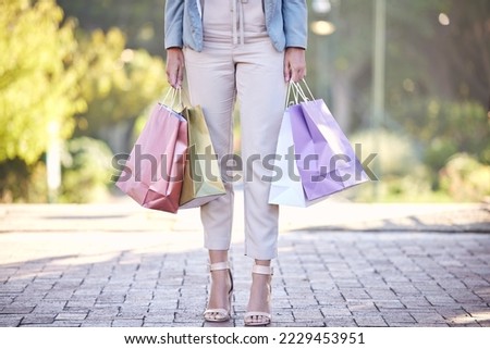 Zoom, fashion shopping bag or woman legs in street road for retail sale, luxury gift or designer clothes in Paris. Rich or travel girl for discount, sales or shopping mall for boutique product brand