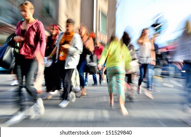 Zoom and motion blurred crowd crossing street. Blur effects made in lens, not post processing. - Powered by Shutterstock