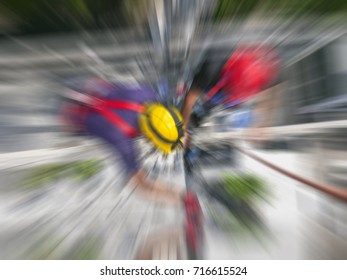 Zoom on construction workers working on frightening dangerous heights