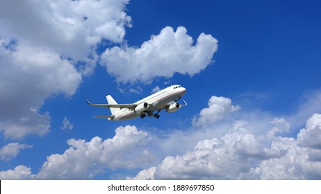 Zoom Photo Of Airbus A320 Passenger Airplane Taking Off In Deep Blue Sky And Beautiful Clouds