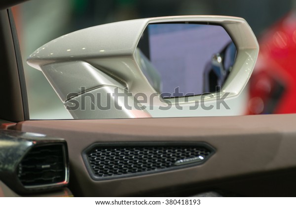 Zoom at sports car mirror and door in Car show\
event at Bangkok, Thailand. This a open event no need press\
credentials required.