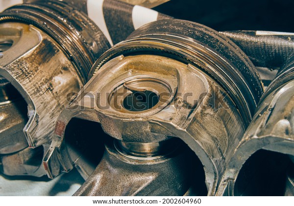 Zoom View Old Aluminum Cylinder or\
Piston and Connecting Rod of Truck Engine in Vintage\
Tone