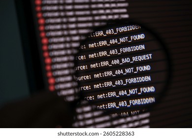 zoomed view of computer screen with magnifying glass highlighting repeated http error codes including 403 forbidden and 404 not found during debugging process - Powered by Shutterstock - Get 15% off with code: PIKWIZARD15