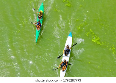 Zrenjanin, Vojvodina, Serbia - August 17, 2019:  Above View On Young Rowers Who Have A Competition In Rowing Kayaks On The River.