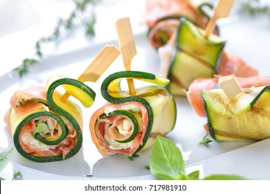 Zucchini appetizer rolls with delicious Italian ham and cream cheese with basil - Powered by Shutterstock