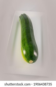 Zucchini or Courgette on a white background