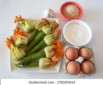 Zucchini Flower Recipe Ingredients With Cottage Cheese On White Background, Natural Light