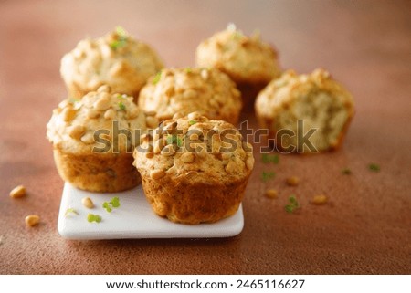 Zucchini muffins with pine nuts
