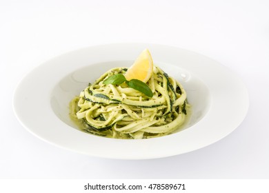 Zucchini Noodles With Pesto Sauce Isolated On White Background

