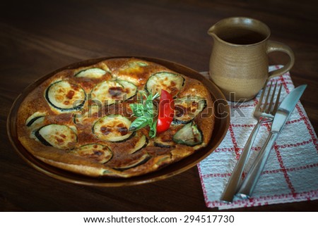 zucchini pancake on a wooden table