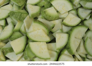 Zucchini sliced for cooking close up detail. Pieces of zucchini. Healthy food. - Powered by Shutterstock