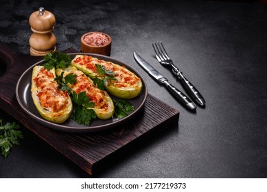 Zucchini stuffed with meat, vegetables and cheese. Zucchini boats. Loaded zucchini