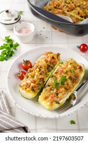 Zucchini stuffed with minced meat and tomatoes and cheese. Baked in the oven. - Shutterstock ID 2197603507