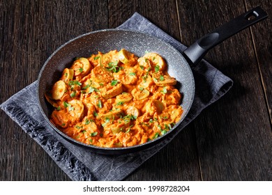 Zucchini, Summer Squash In A Creamy Tomato Sauce In A Pan, Italian Cuisine, Close-up