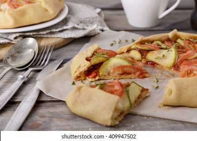 Zucchini And Tomato Galette Open Rustic Pie. Selective Focus
