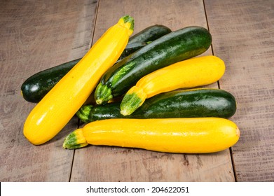 Zucchini And Yellow Squash On A Wooden Table