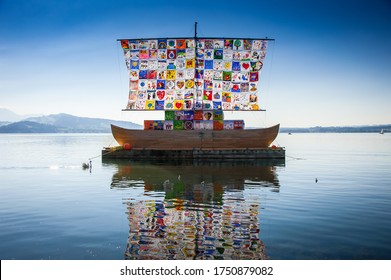 Zug,  Switzerland - September 2016: The Ship Of Tolerance, An  International Art Installation, In Collaboration With Local Children To Spread Messages Of Hope And Tolerance To The World In A Blue Lake