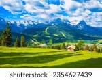 Zugspitze and Alpspitze Alps mountains aerial panoramic view from Eckenhutte viewpoint in Garmisch-partenkirchen town in Bavaria, southern Germany