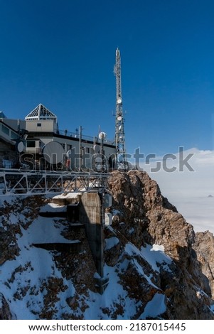 Zugspitze, Bavaria, Germany - 2018 SEP.  Technical Research Centre at Zugspitze Mountains at 9,718 ft above the ground. Telecommunications Antennas with Radar and receivers 