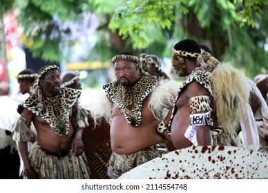 Zulu Warriors in their traditional dress meet Prince Charles and the Duchess of Cornwall on the 22nd of July 2019 in Llanelwedd. the Royals were entertained by traditional war dance.