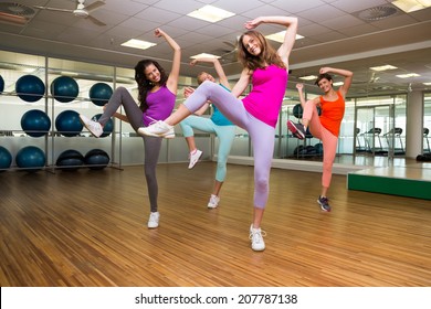 Zumba Class Dancing In Studio At The Gym