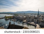 Zurich city Switzerland. Old town wide-angle view, marina and lakeside bridge, roof-top perspective, day time.