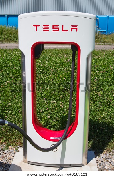 ZURICH - July 30:  Tesla\
Supercharger station on July 30, 2016 in Zurich, Switzerland. Tesla\
motors develops network of the charging stations across Europe and\
World.