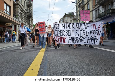 Zurich, Switzerland 06/14/2019: Women Marching And Holding A Large Banner, Protesting At The Women's March 2019 In Frauenstreik Zurich