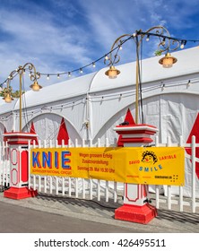 Zurich, Switzerland - 25 May, 2016: fence of Circus Knie temporarily installed on Sechselautenplatz square. Circus Knie is the largest circus of Switzerland, founded in 1803 by the Knie family.
