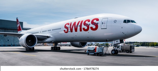 Zurich, Switzerland - April 30 2016: Boeing 777-300ER, the new flagship of Swiss International Air Lines in its home base Zurich Airport.