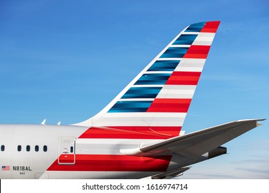 Zurich, Switzerland - January 14, 2020: American Airlines Boeing 787 tail section at Zurich International Airport. American Airlines, Inc. (AA) is a major American airline headquartered in Fort Worth,