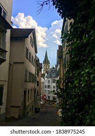 Zurich, Switzerland - July 7th, 2017 - Zurich City Street Panorama, Fraumünster Church Under The Blue Sky