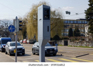 Zurich switzerland - march 10, 2021:Road traffic: speed and red light radar in one device, cars stop in the background, as traffic increases much more is controlled, image is focused on the radar