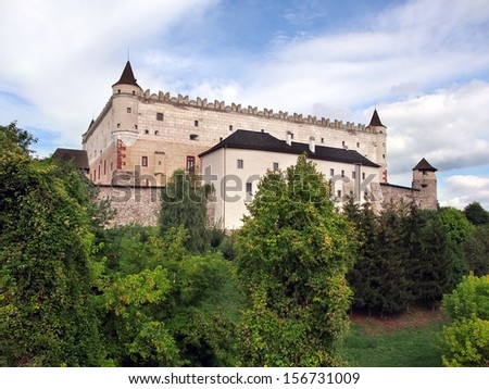 Zvolen Castle on forested hill. This castle is medieval castle build during 14th century. These days Zvolen Castle is opened for tourists and it hosts a regional branch of the Slovak National Gallery.