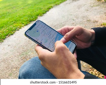 Zwolle, Nederland - September 28, 2019, Apple Product Photographed Outside. IPhone, EarPods, IPad Pro In A Park In Holland.