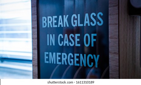Zwolle, Overijssel/Netherlands - 1 10 2020: Close up shot of a wooden ''Break glass in case of emergency"' box.