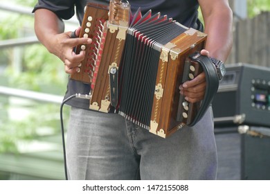Zydeco Accordian player  entertains the crowd at the Waterfront Blues Festival, Portland, Oregon