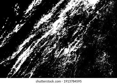 Texture of a waterfall rushing down the mountain steep slope. Falling down stormy water from high rocky cliff for background design. Active fine severe splashes of nature shower on abrasive wall rock