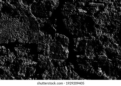 Texture of medieval crumbling stone basement wall. Large hard cobblestones of natural rocky block cement structure. Dirty broken bumpy shabby daub. Retro aged vintage messy masonry for design material