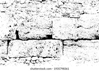 Old grungy retro dirty dusty brick wall of ancient city. Uneven pitted peeled surface brickwork of cellar worn. Ruined shabby stiff blocks. Hard solid messy ragged holes brickwall for 3D grunge design