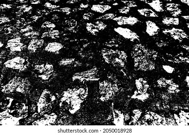 Old paved vintage alley, uneven paseo way footpath.Retro pathway castle of design farm town.Aged rough grunge dry stone blocks of lane. Damaged shabby rustic nice bumpy hard durable relief sett avenue