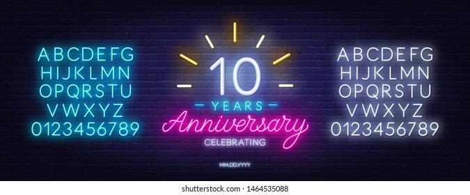 10 anniversary celebration neon sign on a dark background. Neon alphabet . Template for invitation or greeting card.