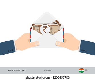 10 Indian Rupee Banknotes in envelope hold in hand. Flat style opened white envelope with cash. Salary payout or corruption concept.