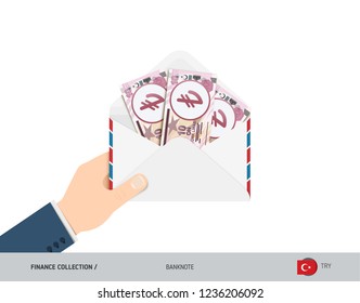 10 Turkish Lira Banknotes in envelope hold in hand. Flat style opened white envelope with cash. Salary payout or corruption concept.