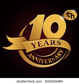 10 years golden anniversary logo celebration with  golden ring and ribbon.