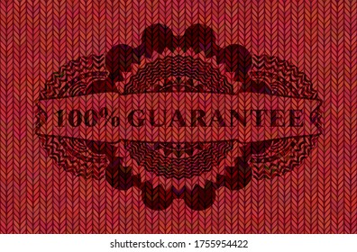 100% Guarantee text inside Red woolen fabric realistic badge. Cloth fancy background. Intense illustration. 