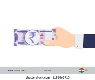 100 Indian Rupee Banknote. Hand gives money. Flat style vector illustration. Salary payout or corruption concept.