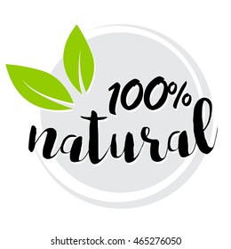 100% Natural Stamp - Vector concept with green leaves and calligraphic letters