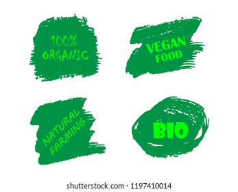 100% Organic, bio, eco, natural product, vegan food, natural farming, vegetarian labels. Vector collection of paint brush strokes isolated on white background. Hand drawn abstract design elements set.